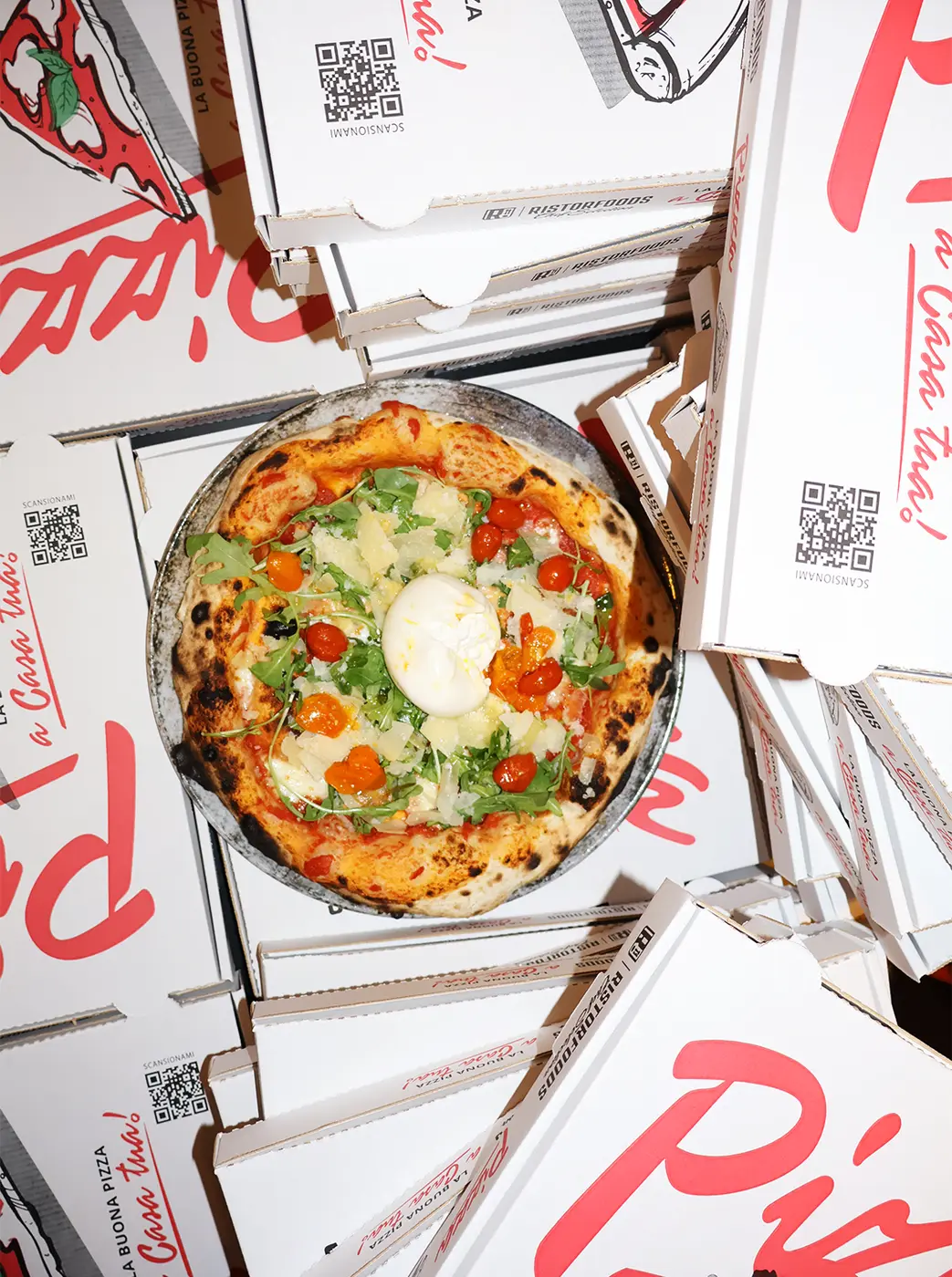 Pizza et boîtes Marco Polo vues du dessus